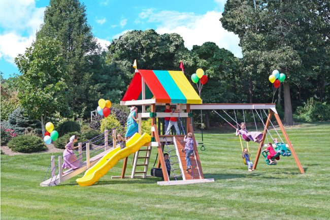 211-Scenic-Pointe-scaled-1 Children playing on Playmor swingset
