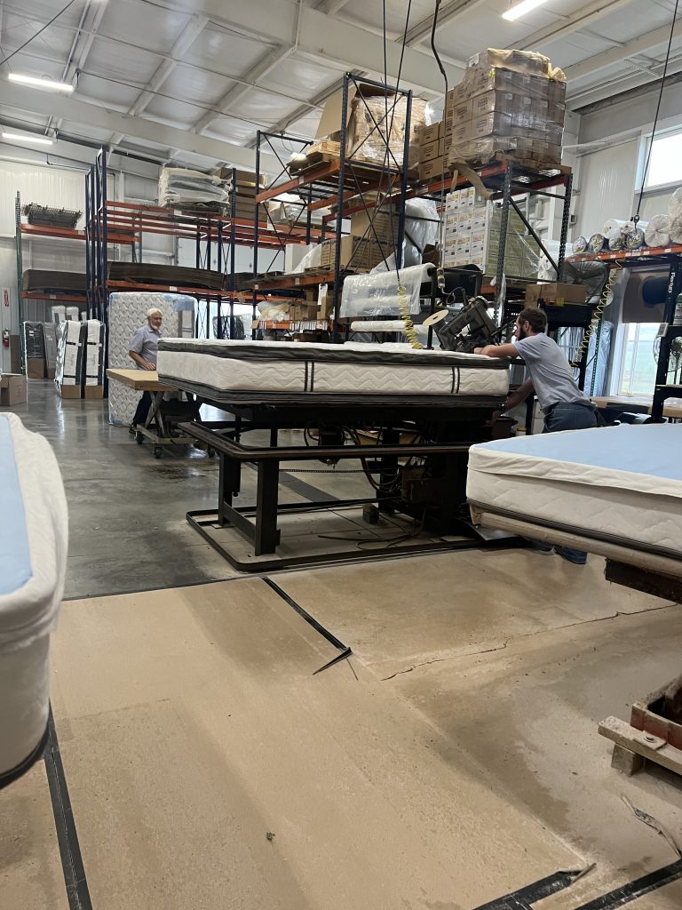 Amish men constructing Amish mattress