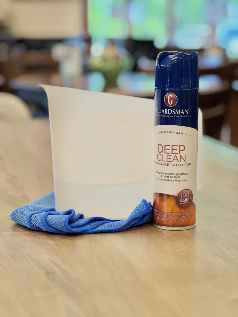 Pitcher of warm water and Guardsman furniture cleaner