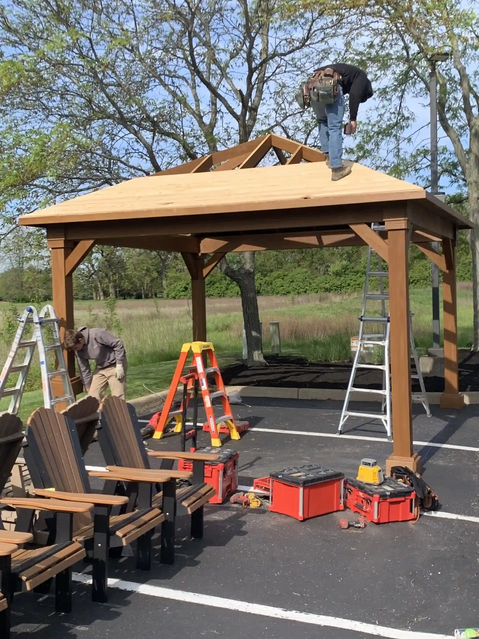 Berlin Gardens craftsmen assembling and installing a made-to-order wood structure in Ohio