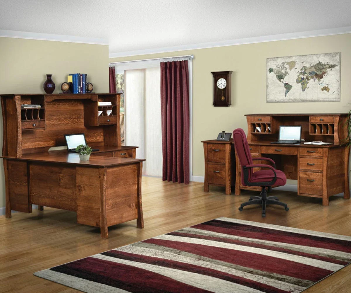 Amish Kapernaum office collection in a staged office with a wood desk and hutch and a red leather office chair.