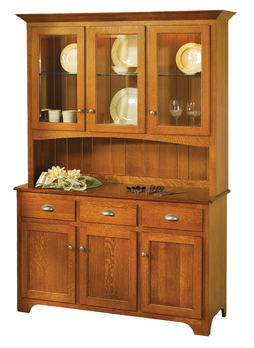 Amish Mary Ann four-door hutch base in oak with drawers over cabinet doors.