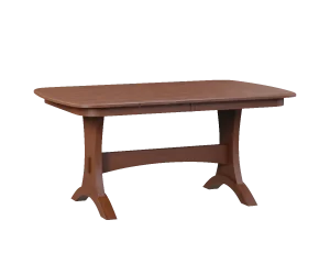 Amish Brookport trestle dining table in warm brown wood.