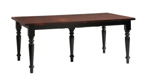 Amish Olympia dining table in a two-tone finish with turned dark legs and a wood top.