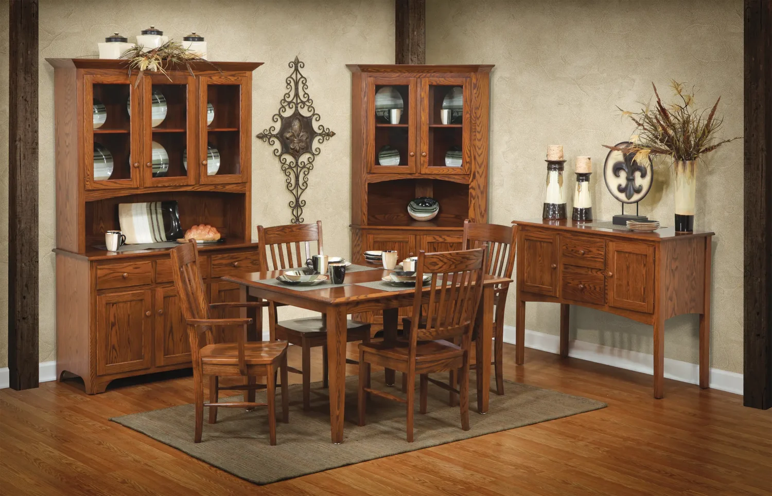 Amish Shaker dining collection in cherry, staged with a table, chairs, hutch, and buffet.