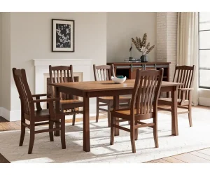 Amish Lynnfield dining collection in warm brown wood, shown with a table and chairs in a neutral room.