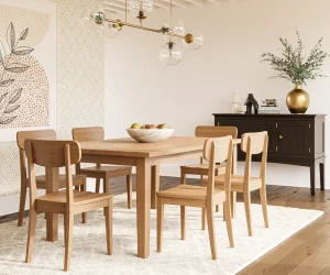 Amish Richville dining collection in light natural wood, shown with a modern table and chairs.