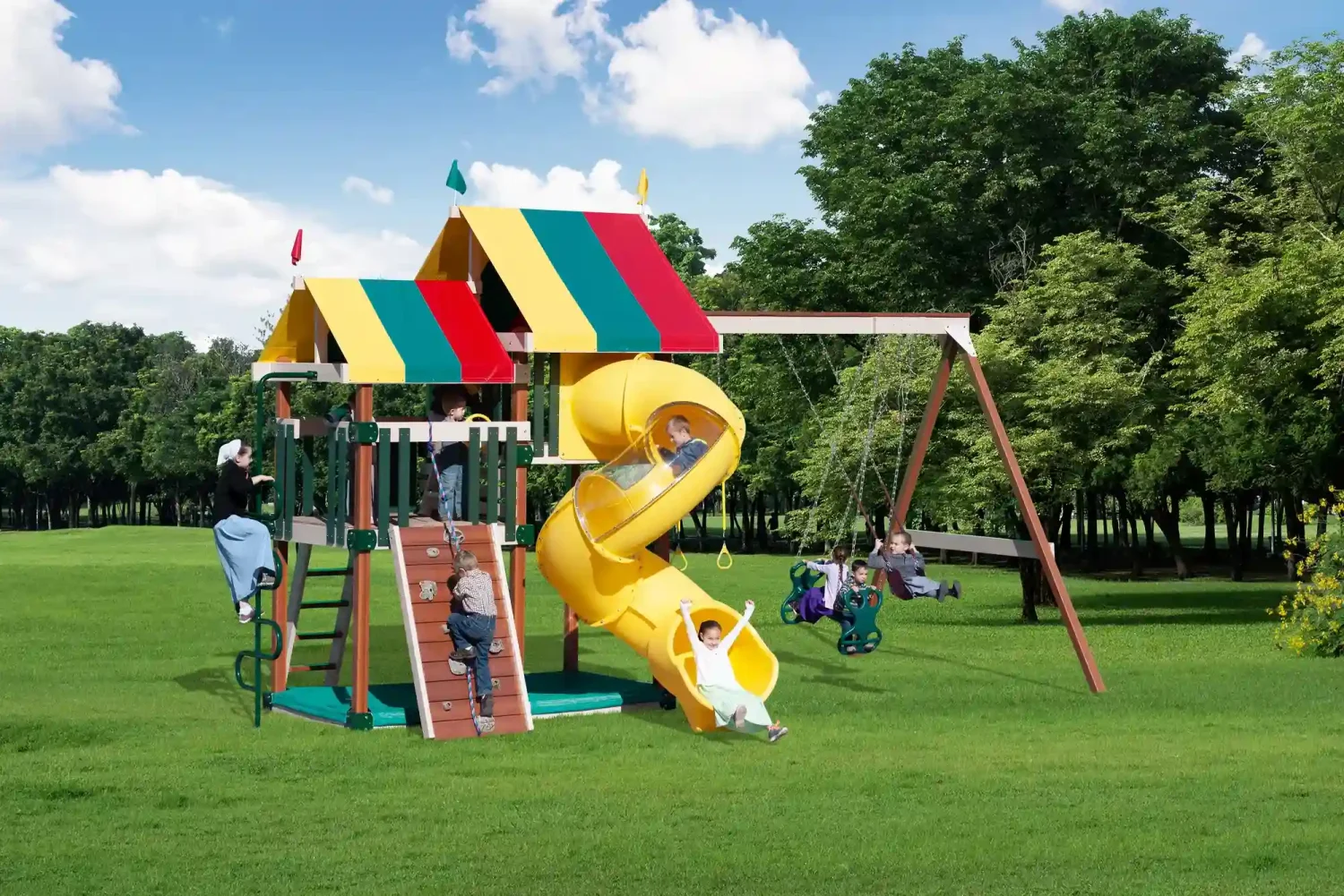 Amish Playmor Mid Sized playset, a large wooden swing set with a striped canvas roof, yellow spiral tube slide, rock wall, and swings with children playing.